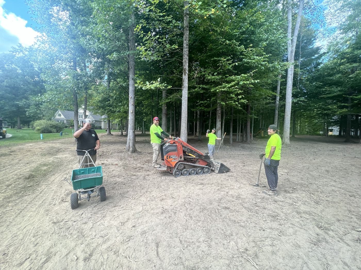 Conner Tree Service crew clearing a site in full protective gear.